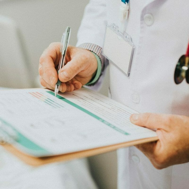 Doctor writing prescription