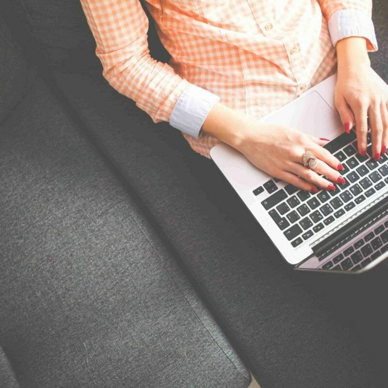 Woman on laptop researching