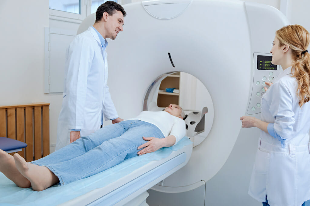 COPD patient undergoing CT scan to detect abnormalities in the lungs.