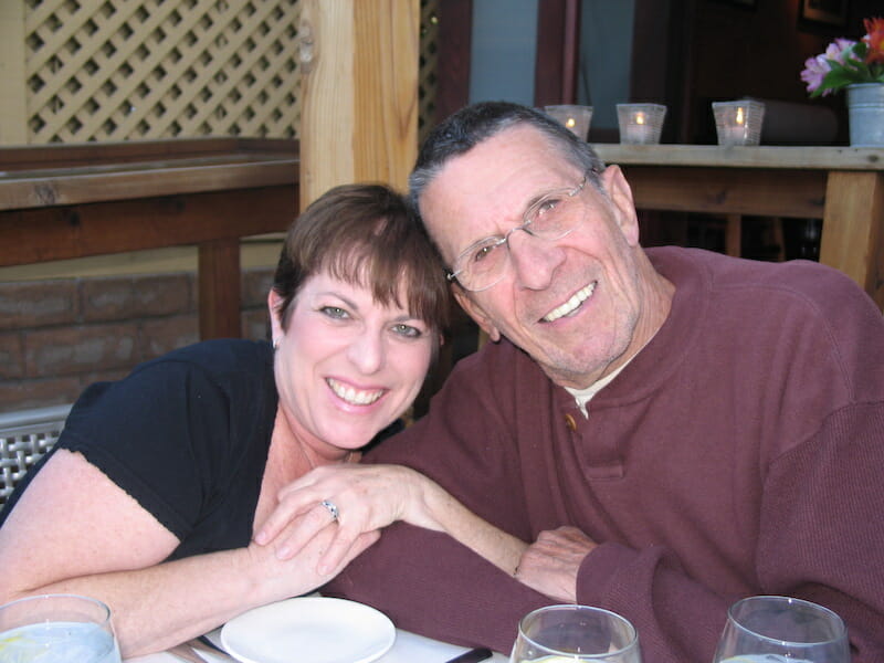 Julie sitting at a restaurant with her father
