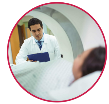 A patient inside a CT machine being scanned
