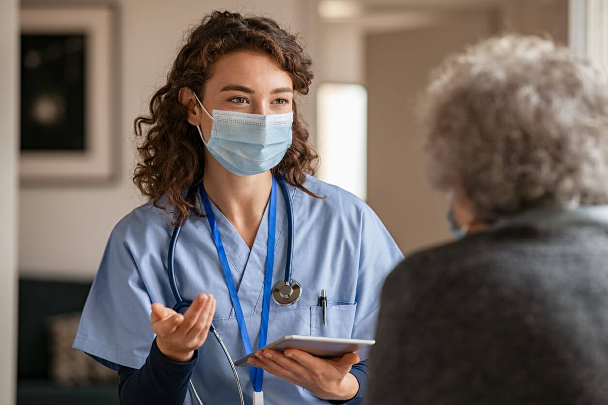 Female doctor speaking to a patient about how to get tested for COPD.