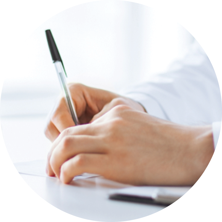 A doctor holding onto a pen with both hands