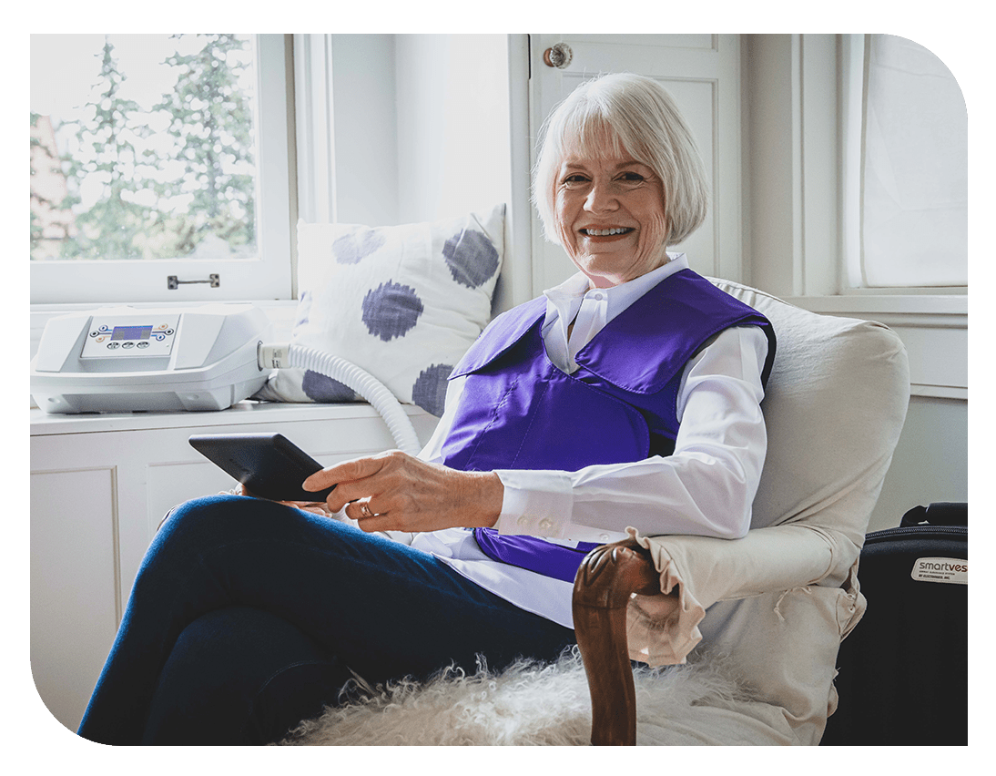 Older woman using SmartVest at home
