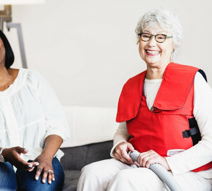 patient with friends doing smartvest therapy