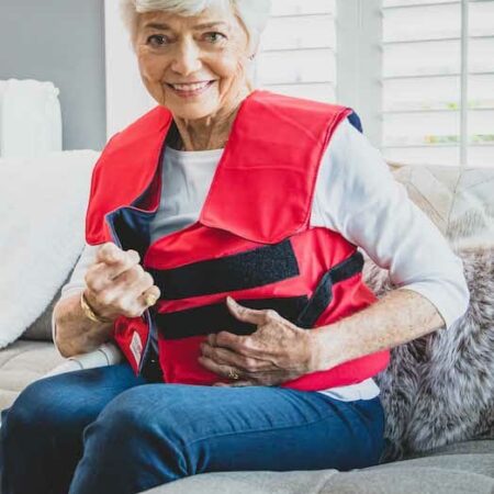 Woman adjusts the straps on her SmartVest